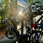 Van rear door open with four bikes on Tokul Racks Panel Bike Rack