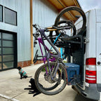 Tokul Racks Extra Special Basket holding Yeti Tundra 35 cooler on van rear door