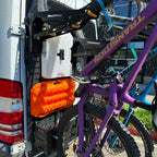 Tokul Racks Extra Special Basket with additional gear storage alongside bikes on van door