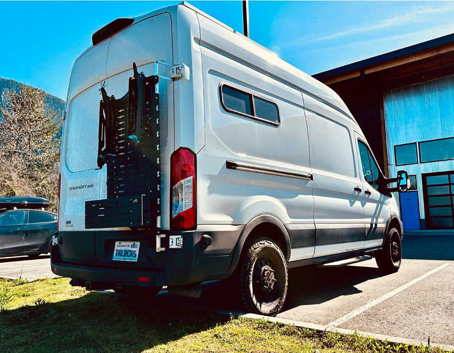 Tokul Racks Mullet Panel with Panel Bike Rack and Extra Special Basket on Ford Transit
